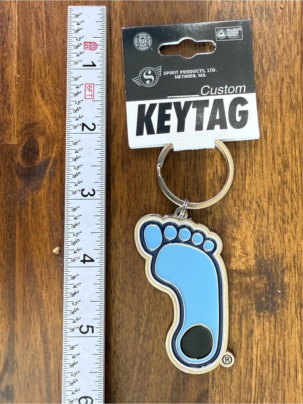 NCAA North Carolina Tar Heels Silver Keychain with Enameled Famous Foot Logo NWT